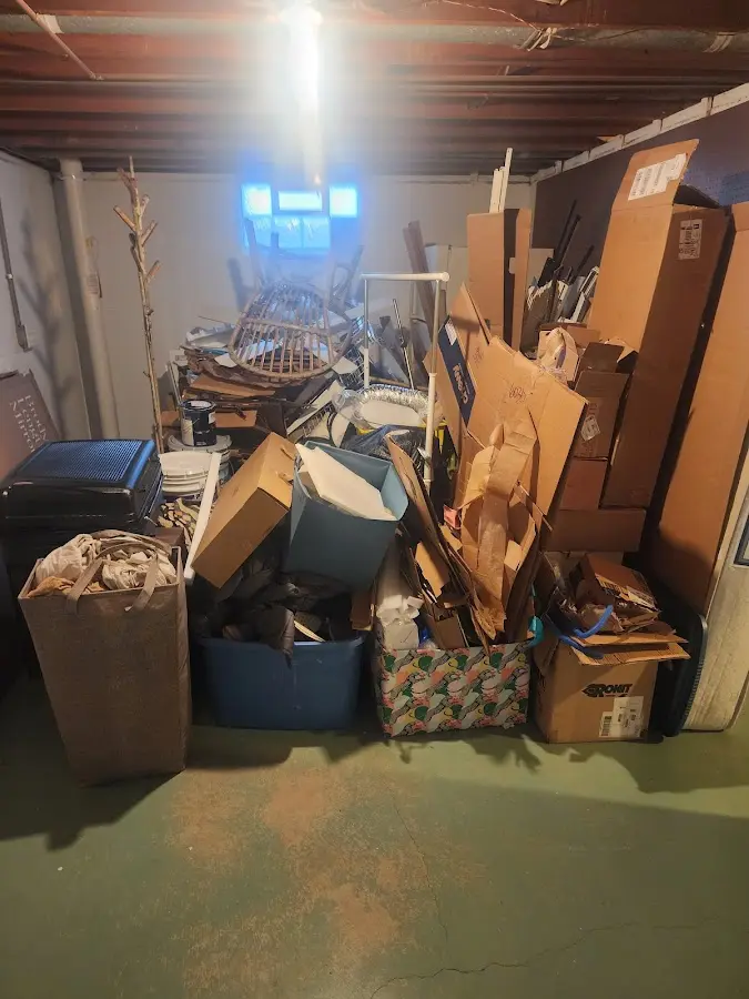 Roll-off dumpster container at job site for 2 Yard Dumpster Rental in Elizabeth